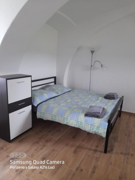 Postel nebo postele na pokoji v ubytování Kojan