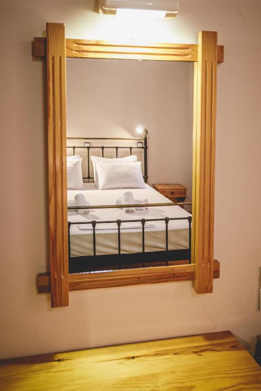 Postel nebo postele na pokoji v ubytování Hotel EPIDAVROS