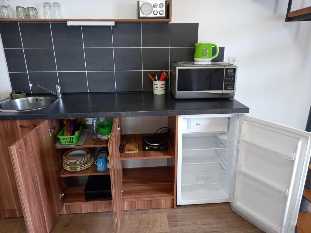 Kuchyň nebo kuchyňský kout v ubytování Apartmán U Jakuba