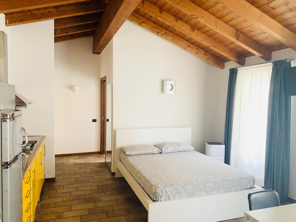 Łóżko lub łóżka w pokoju w obiekcie Casa Cleopatra