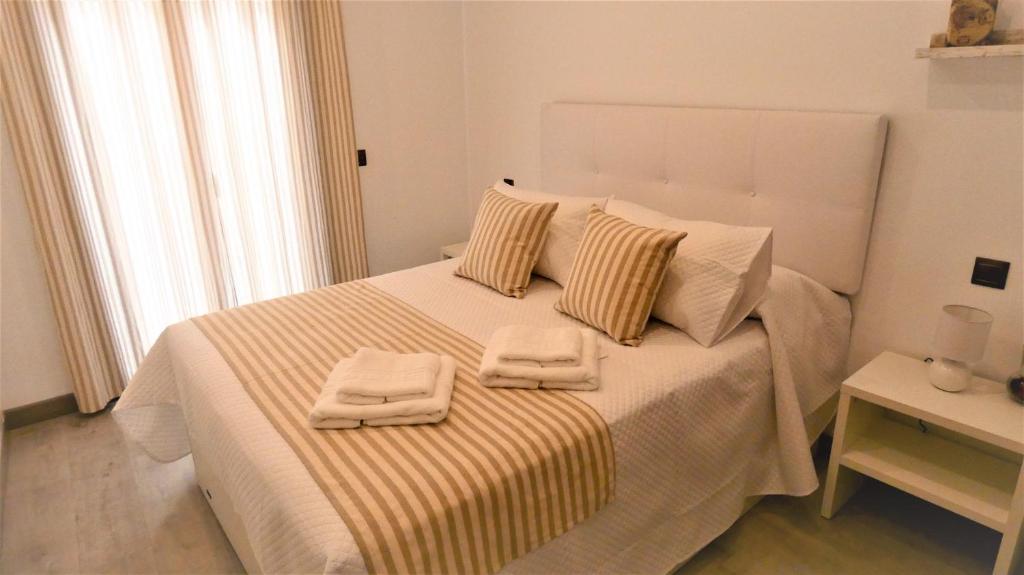 Posteľ alebo postele v izbe v ubytovaní Casa Barbero