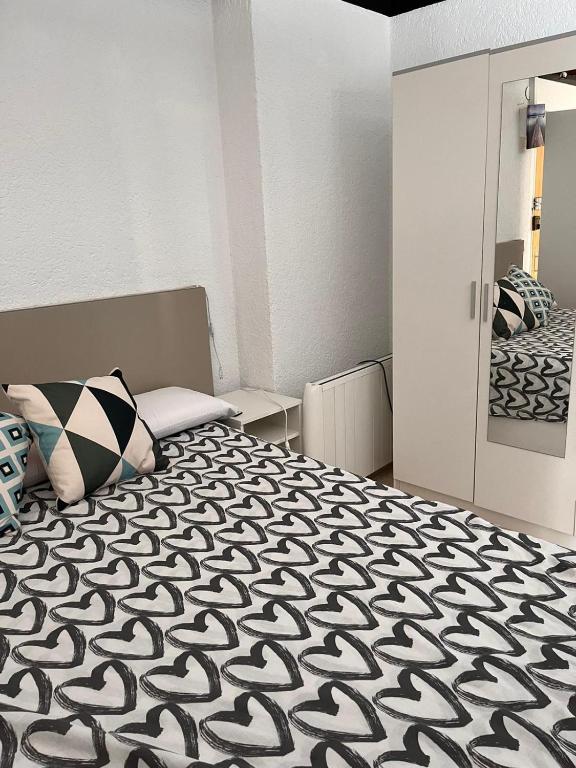 Posteľ alebo postele v izbe v ubytovaní Apartamento Vacacional & Holiday
