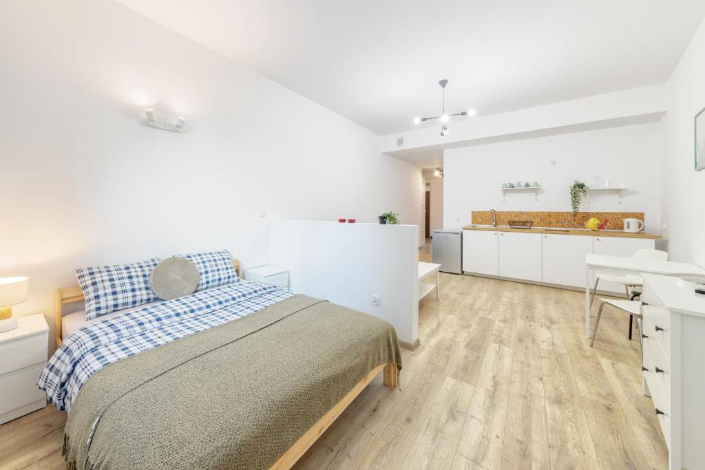 Kuchyňa alebo kuchynka v ubytovaní Open Lakes Apartamenty Giżycko