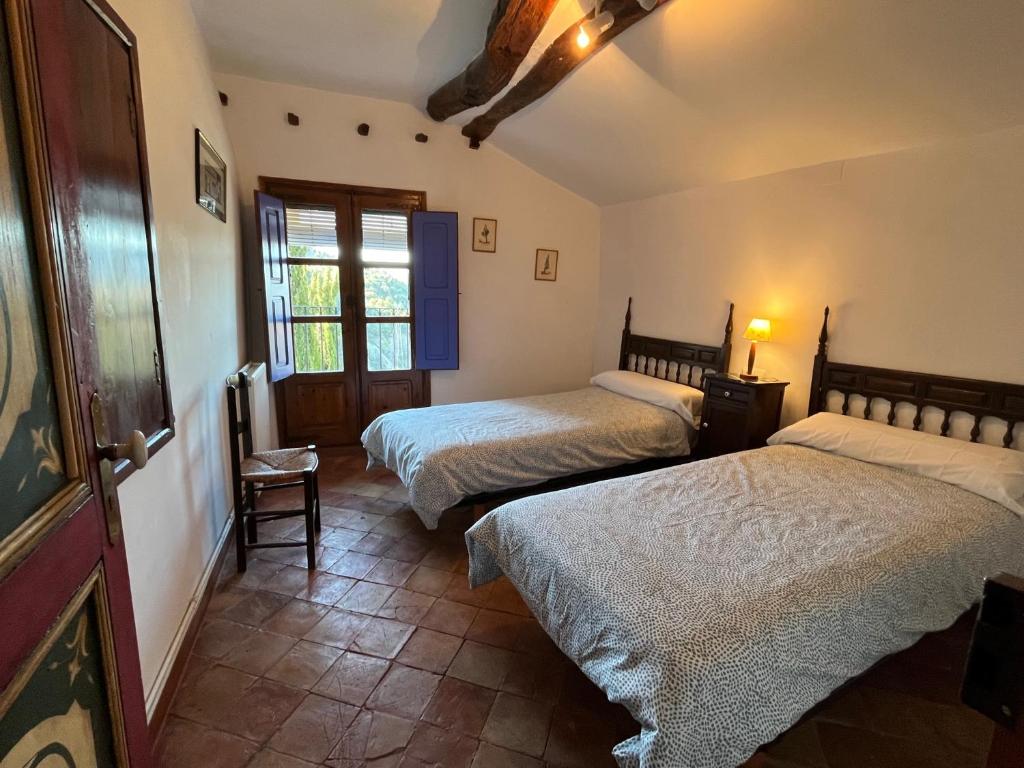 Postel nebo postele na pokoji v ubytování Casa Blas