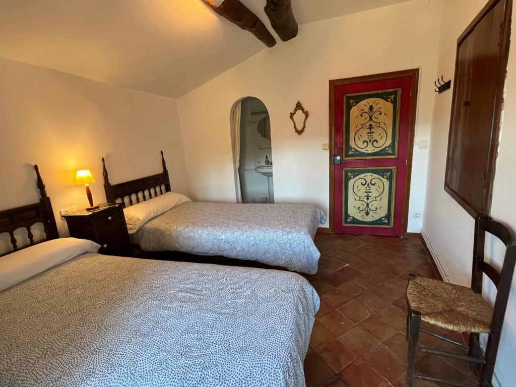 Postel nebo postele na pokoji v ubytování Casa Blas