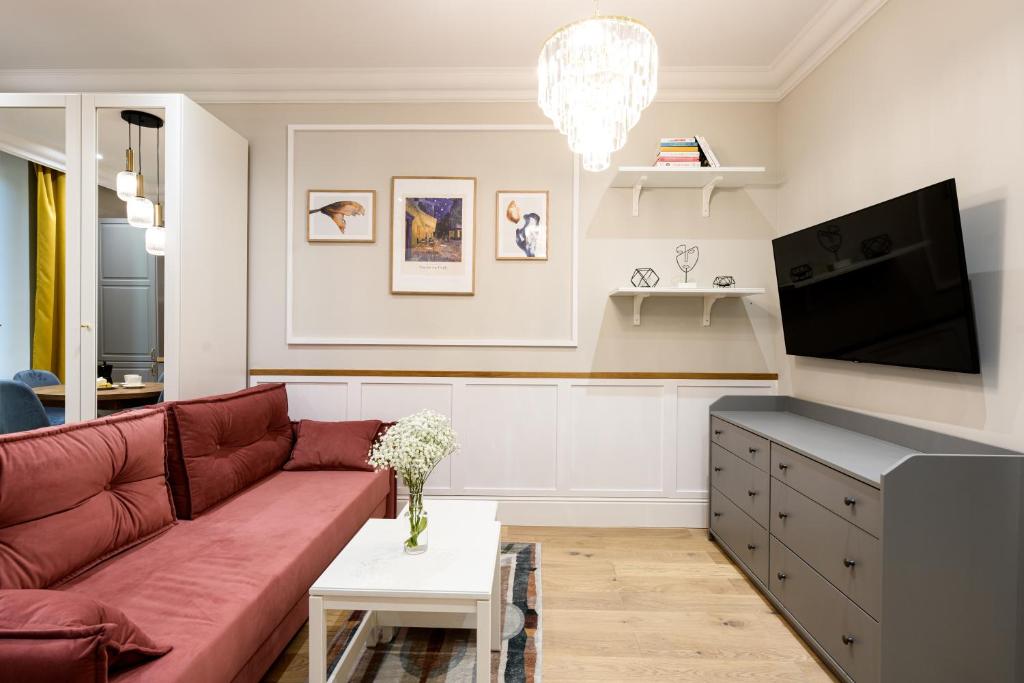 Televízia a/alebo spoločenská miestnosť v ubytovaní Native Apartments Nowowiejska 9