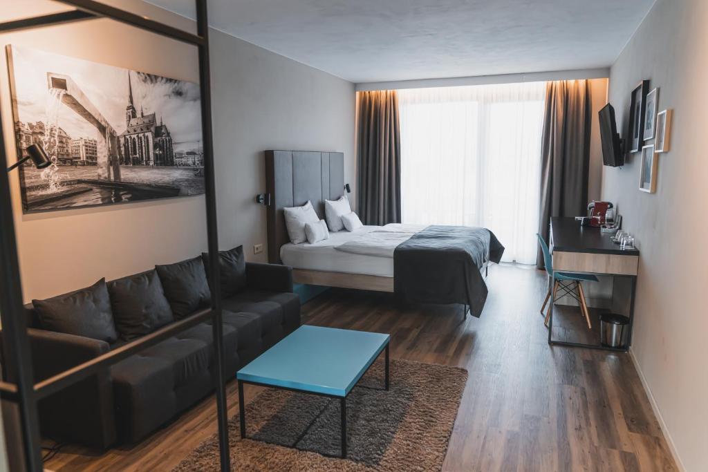 Postel nebo postele na pokoji v ubytování Avenue Pallova 28