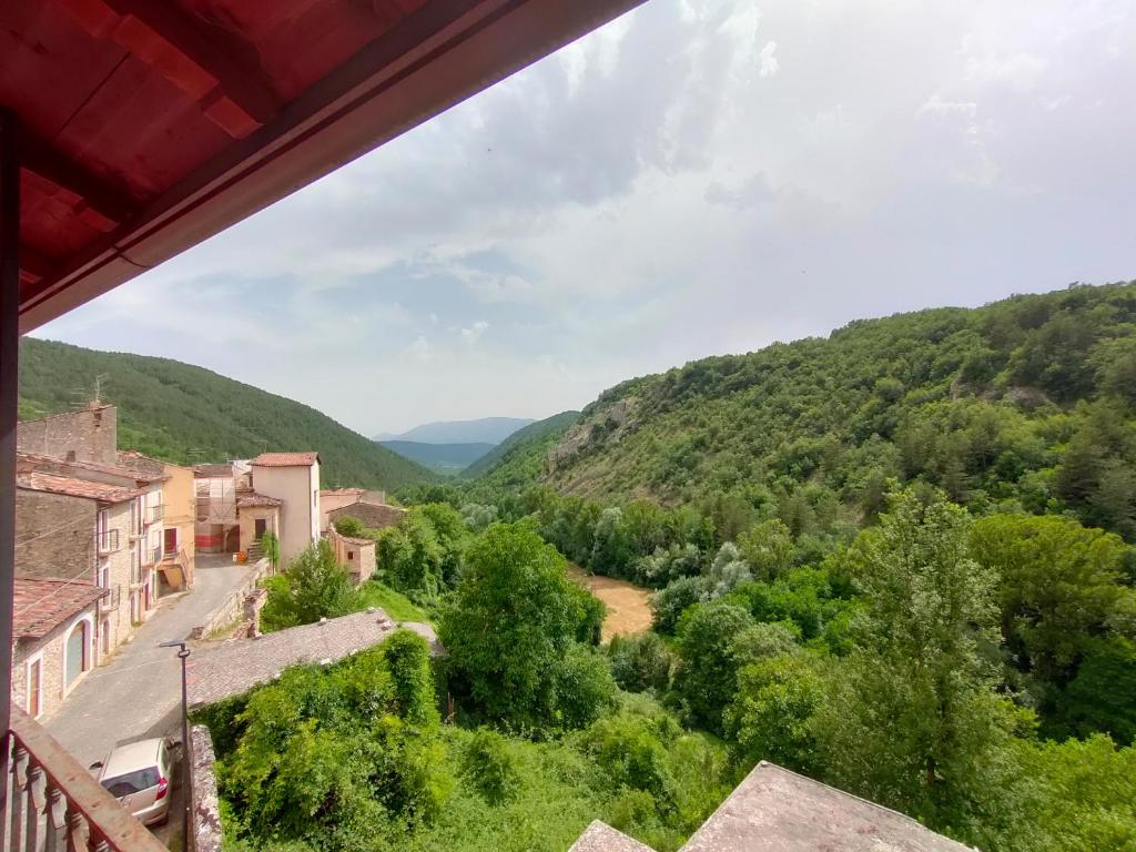 a view of the mountains from a house at Il Narciso appartamenti in Assergi