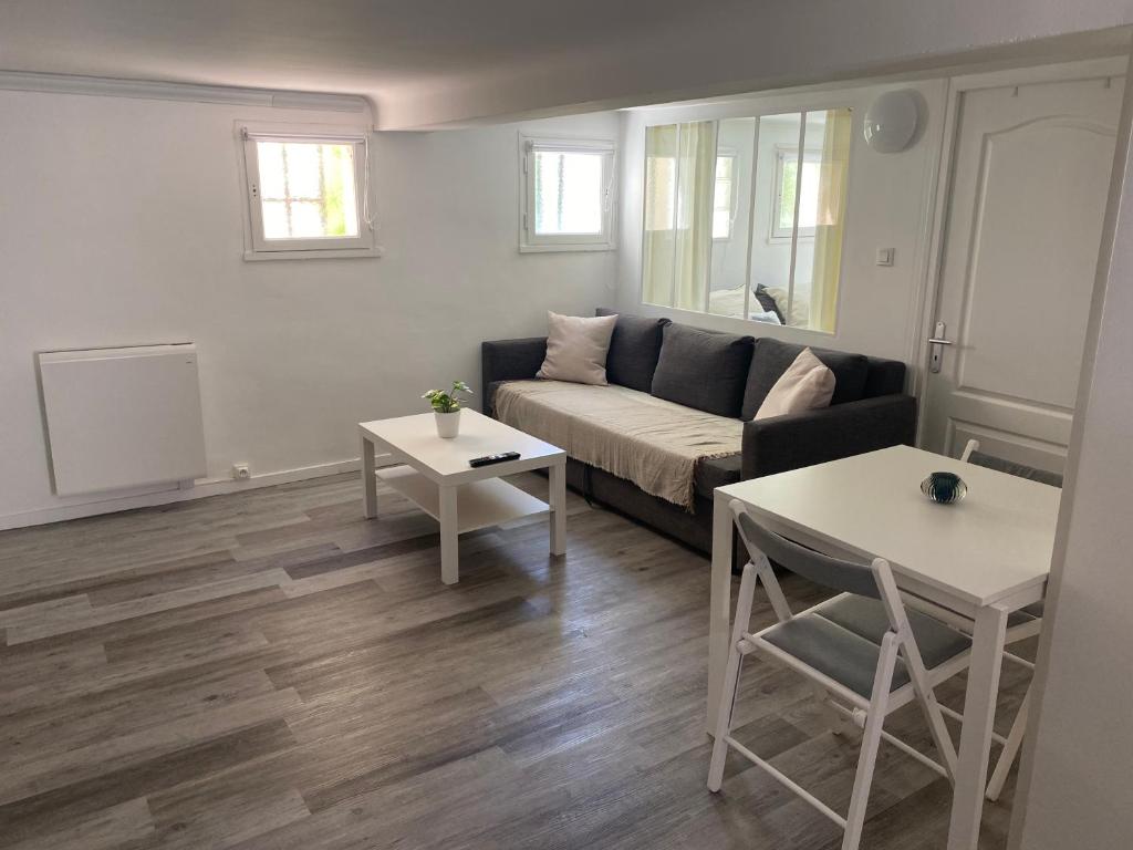 Ruang duduk di Appartement cosy en résidence