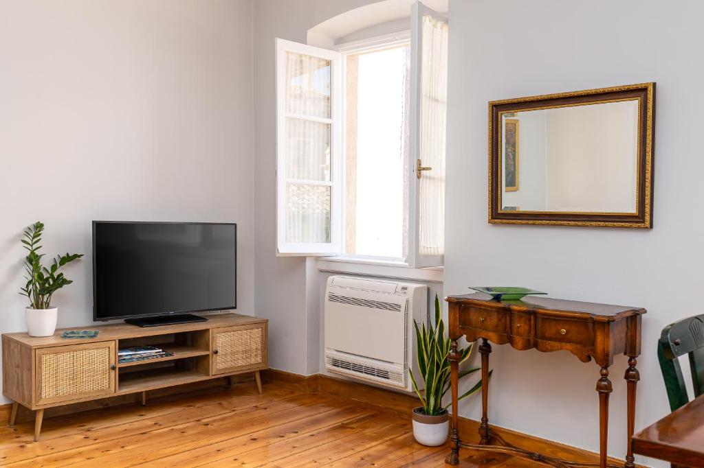 TV a/nebo společenská místnost v ubytování La Rondine