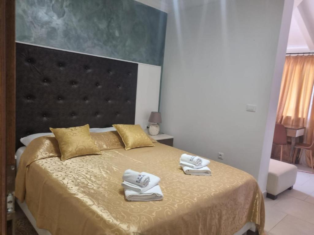 Postel nebo postele na pokoji v ubytování Villa Natka