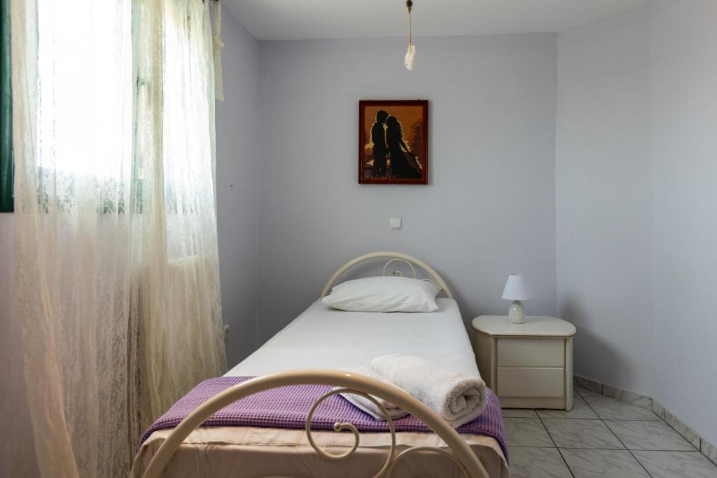 Postel nebo postele na pokoji v ubytování A&S Seaside Maisonette