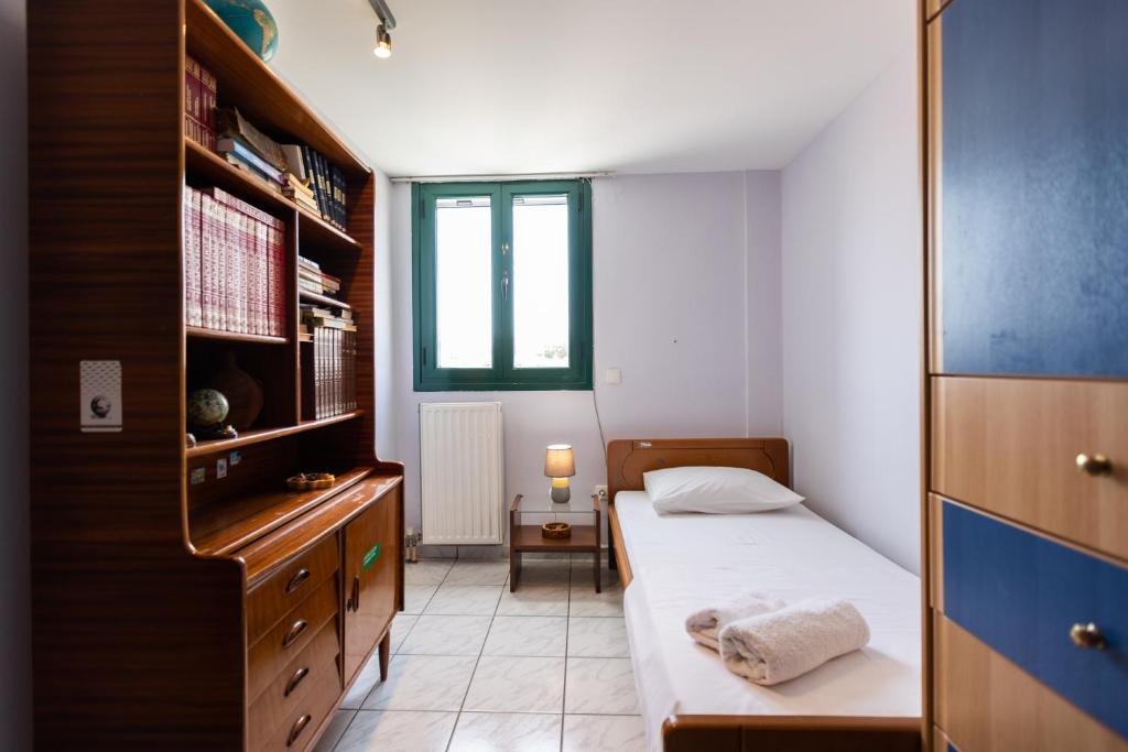 Postel nebo postele na pokoji v ubytování A&S Seaside Maisonette