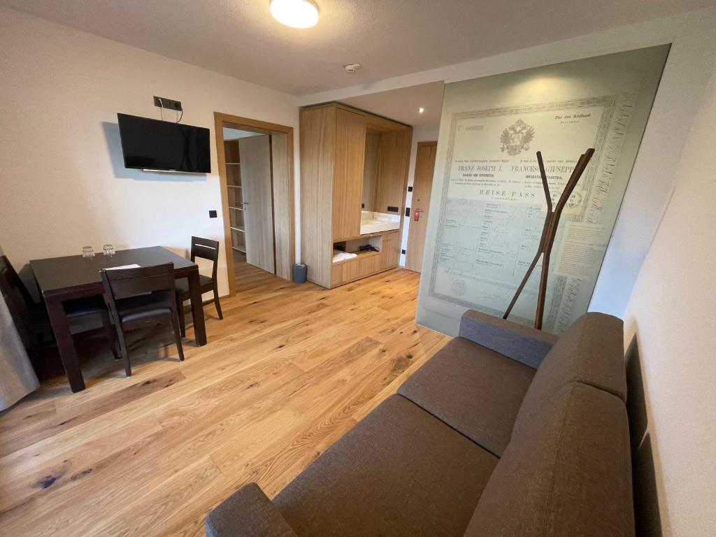 TV a/nebo společenská místnost v ubytování Panoramahotel Sonnhalde