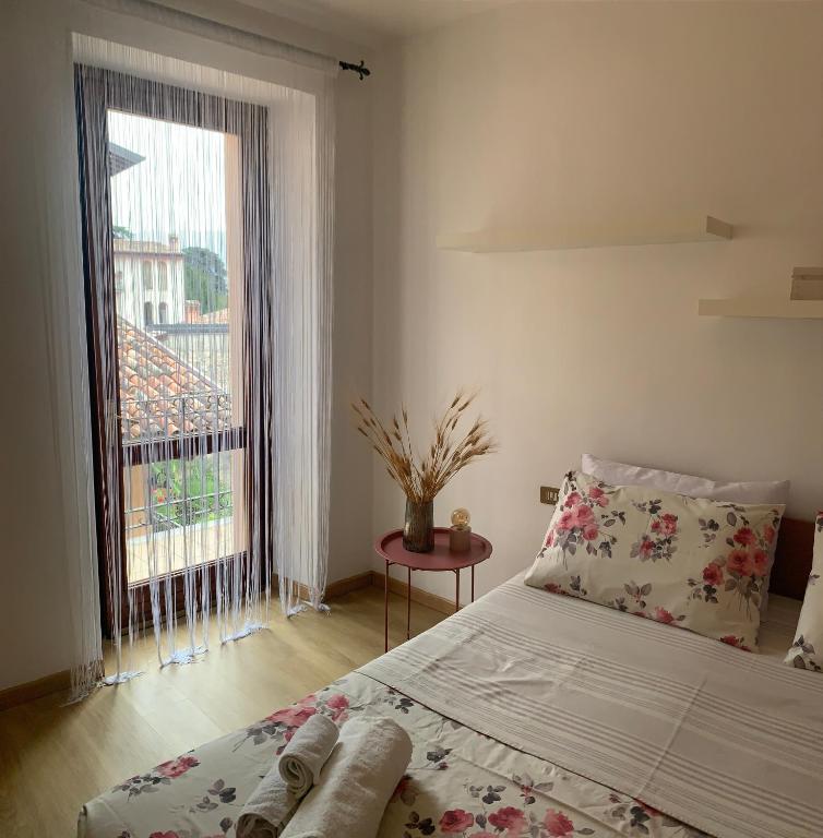 Łóżko lub łóżka w pokoju w obiekcie CLO APARTMENT