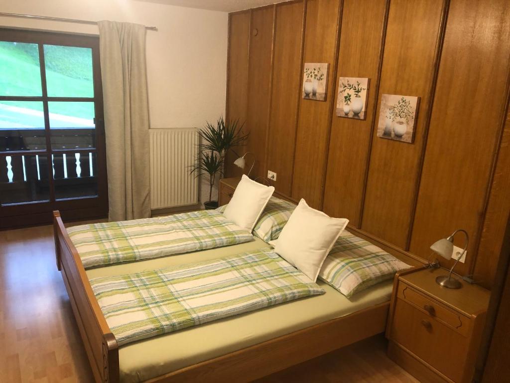 Postel nebo postele na pokoji v ubytování Kailgut