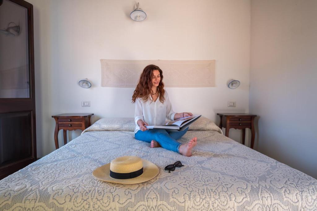 Postel nebo postele na pokoji v ubytování Ghivine Albergo Diffuso