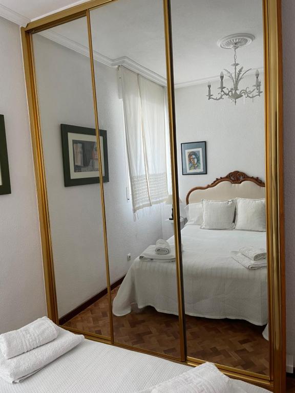 Postel nebo postele na pokoji v ubytování Piso Urbano Garcia De la Cruz