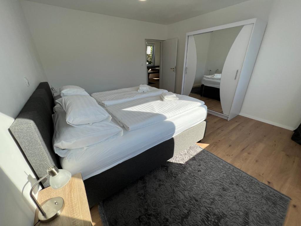 Postel nebo postele na pokoji v ubytování Guesthouse Avsenik