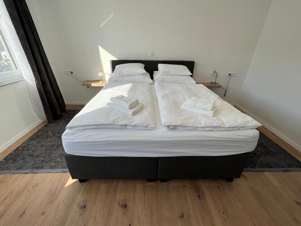Postel nebo postele na pokoji v ubytování Guesthouse Avsenik