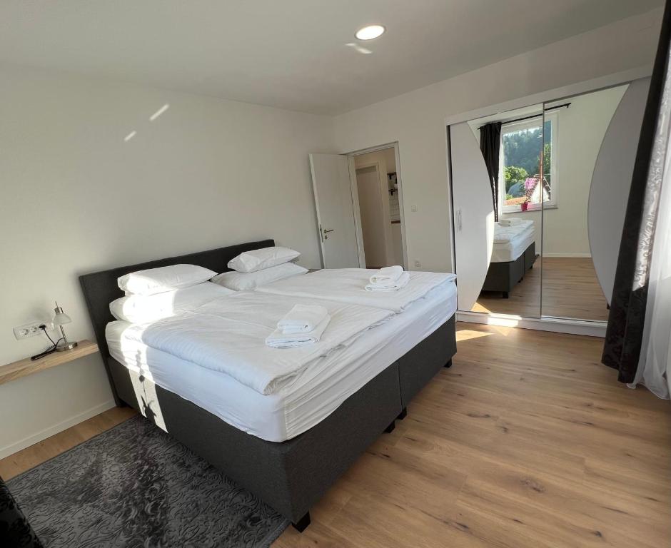 Postel nebo postele na pokoji v ubytování Guesthouse Avsenik