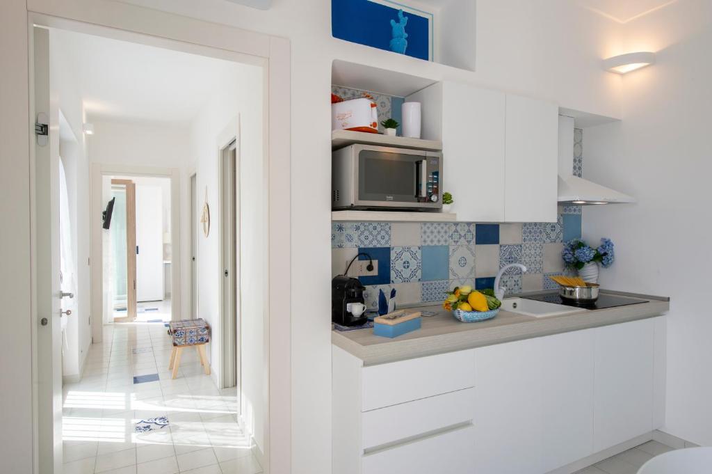 Кухня или мини-кухня в Residence Buonocore
