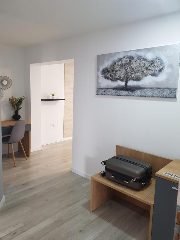 Televízia a/alebo spoločenská miestnosť v ubytovaní Rooms Vanteo