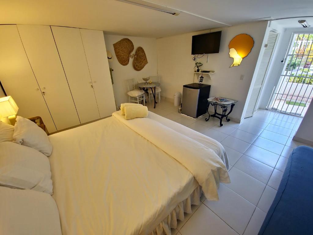 Postel nebo postele na pokoji v ubytování Adonai Hotel Boutique