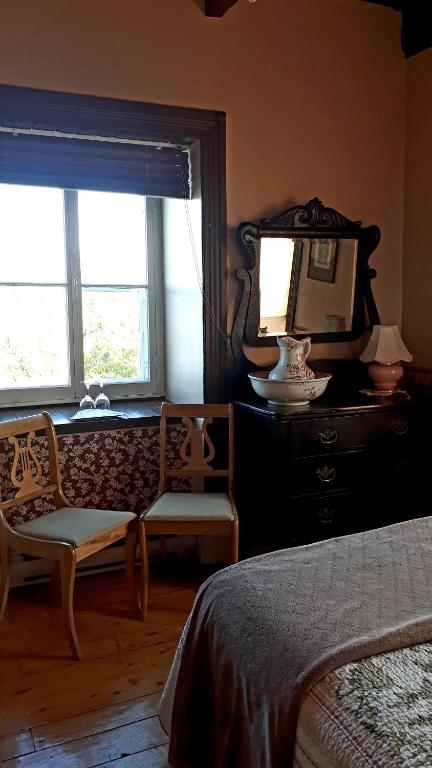 Postel nebo postele na pokoji v ubytování Auberge le Petit Séjour