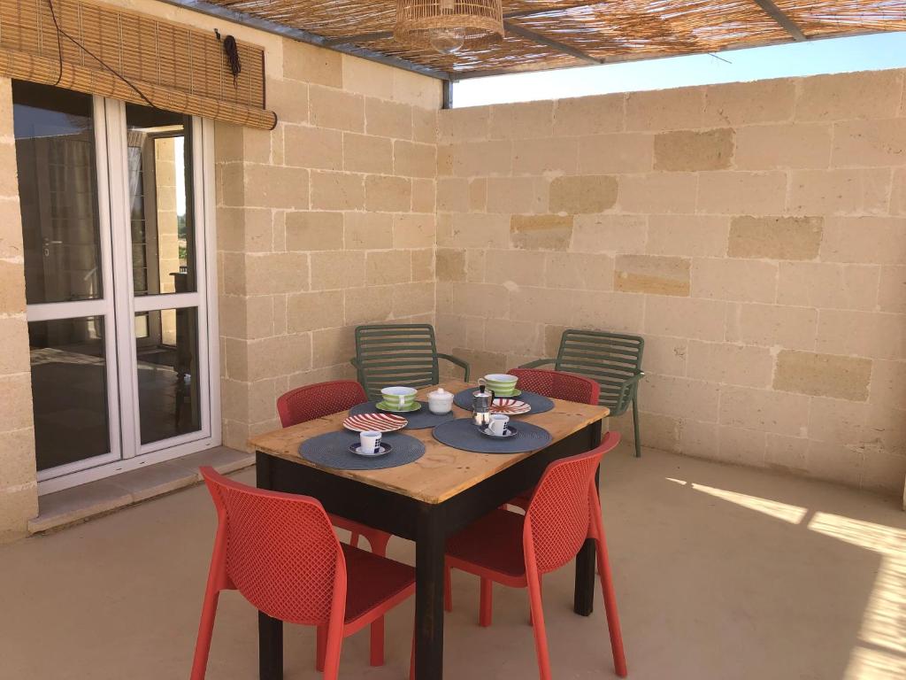 Patio lub wspólna przestrzeń na świeżym powietrzu w obiekcie FICOMORO FARM