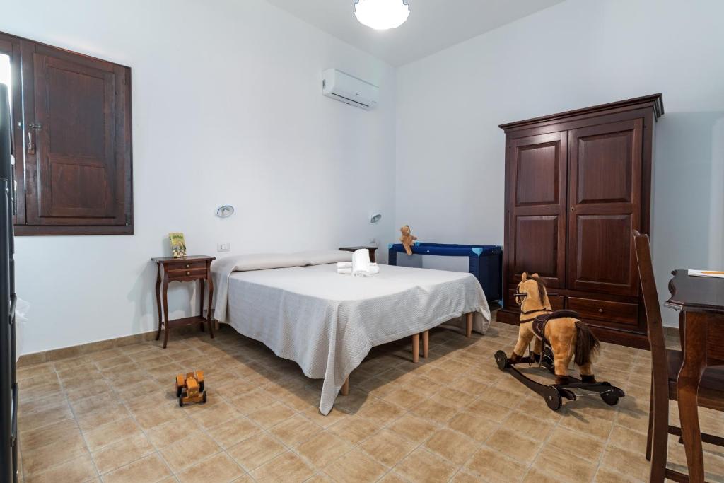 Postel nebo postele na pokoji v ubytování Ghivine Albergo Diffuso