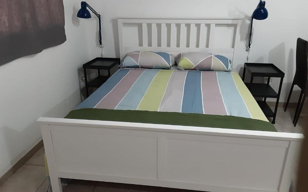Кровать или кровати в номере Villa Colonial suite n 3 familiar
