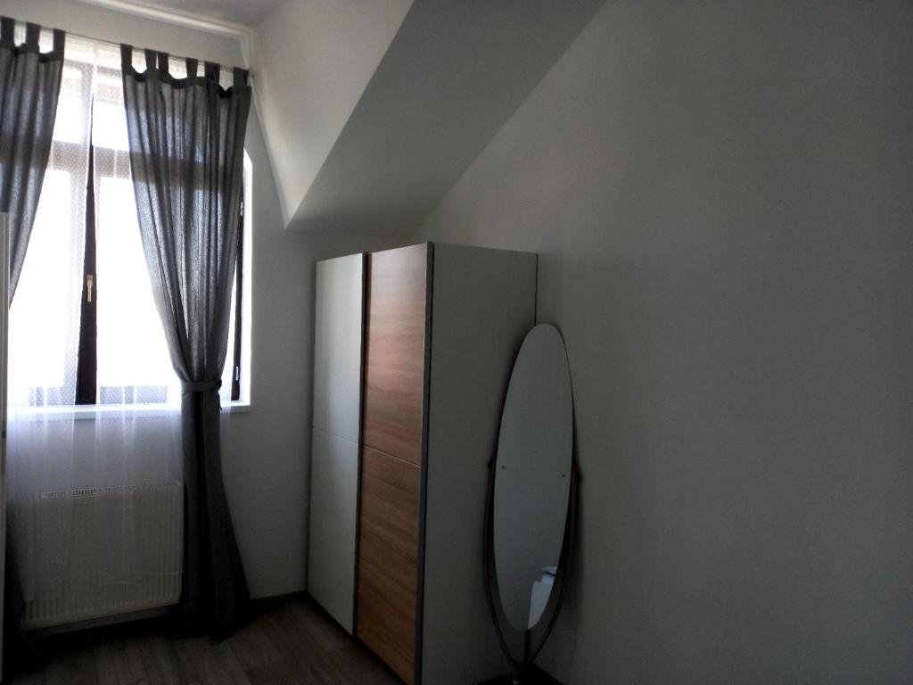 Televízia a/alebo spoločenská miestnosť v ubytovaní Apartmani Dubrava 1