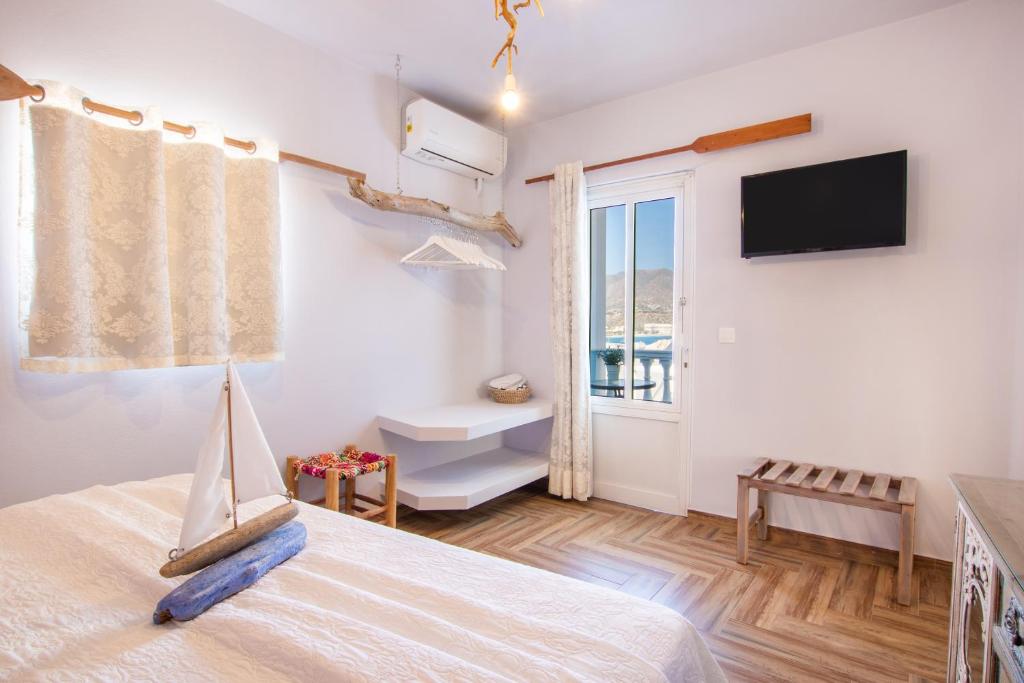 Postel nebo postele na pokoji v ubytování Gorgona Blue Apartments