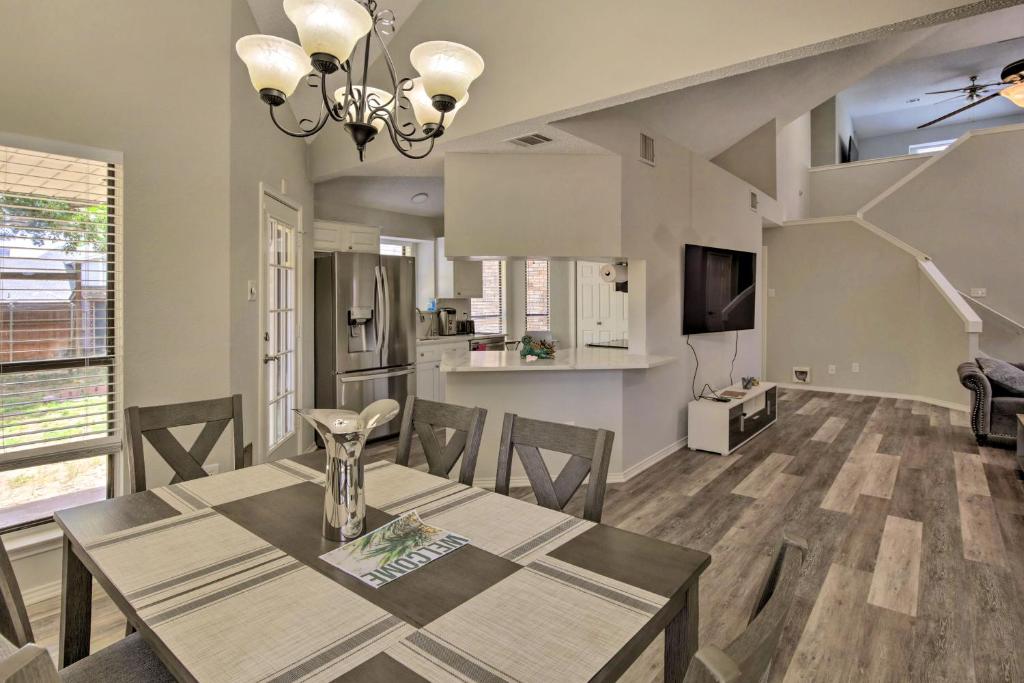 a dining room and kitchen with a table and chairs at Convenient Allen Retreat, 2 Mi to Downtown! in Allen