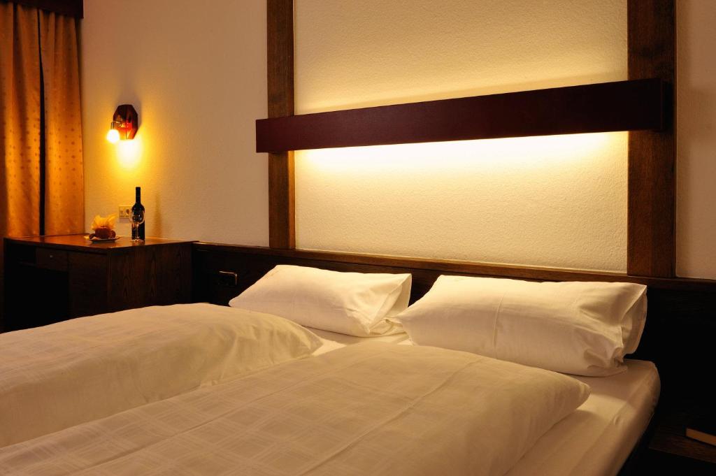 Postel nebo postele na pokoji v ubytování Hotel Pflug