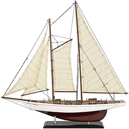 a model of a sail boat on a stand at Jungas nams in Liepāja