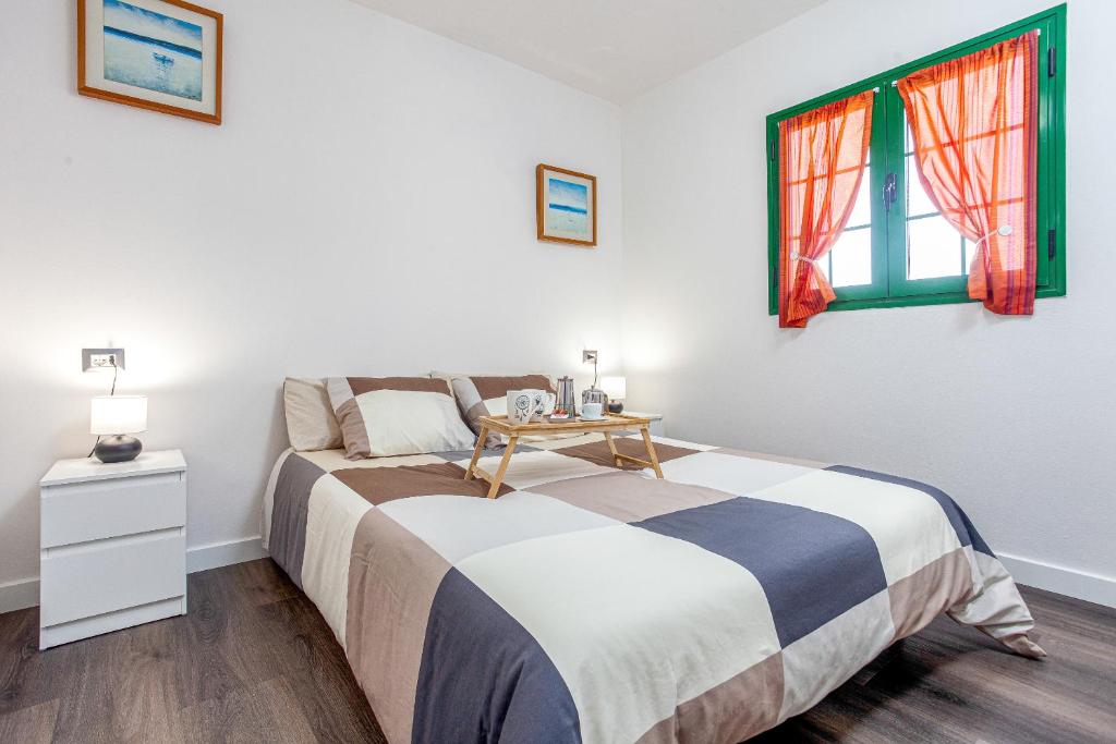 Postel nebo postele na pokoji v ubytování CASA IGNAZIA in Lajares