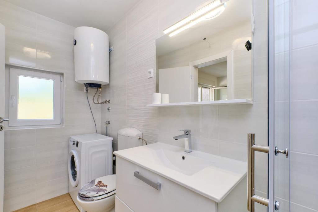 Kúpeľňa v ubytovaní Apartman Ursula Stivan