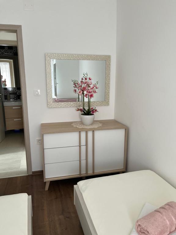 Postel nebo postele na pokoji v ubytování Apartmani Anloma Lorainne