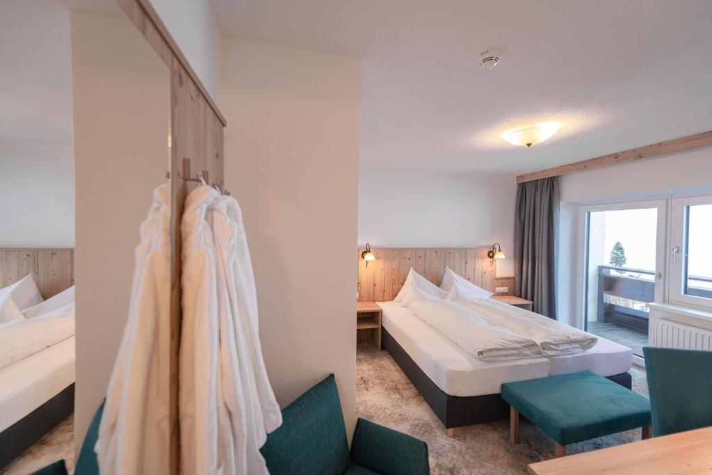 Postel nebo postele na pokoji v ubytování Hotel Venter Bergwelt
