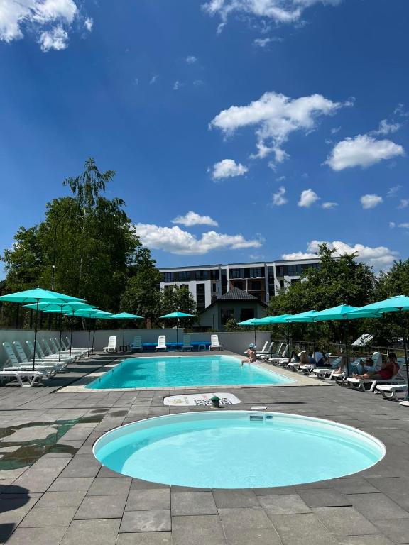 Bazén v ubytování Arena Apart - Hotel nebo v jeho okolí