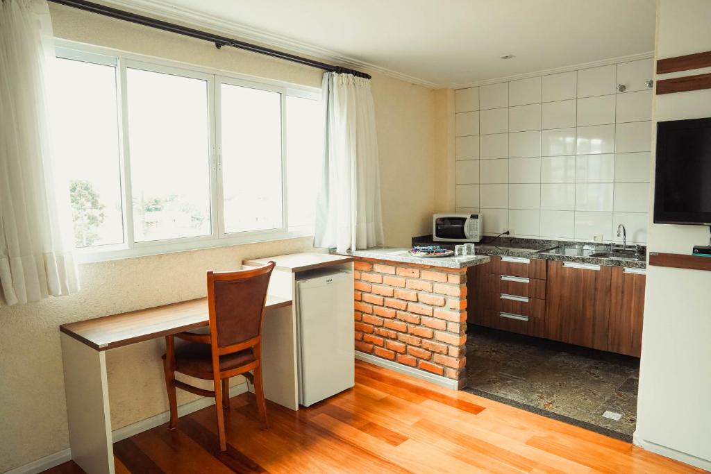 Kuchyň nebo kuchyňský kout v ubytování Hotel Imperial de Quatro Barras