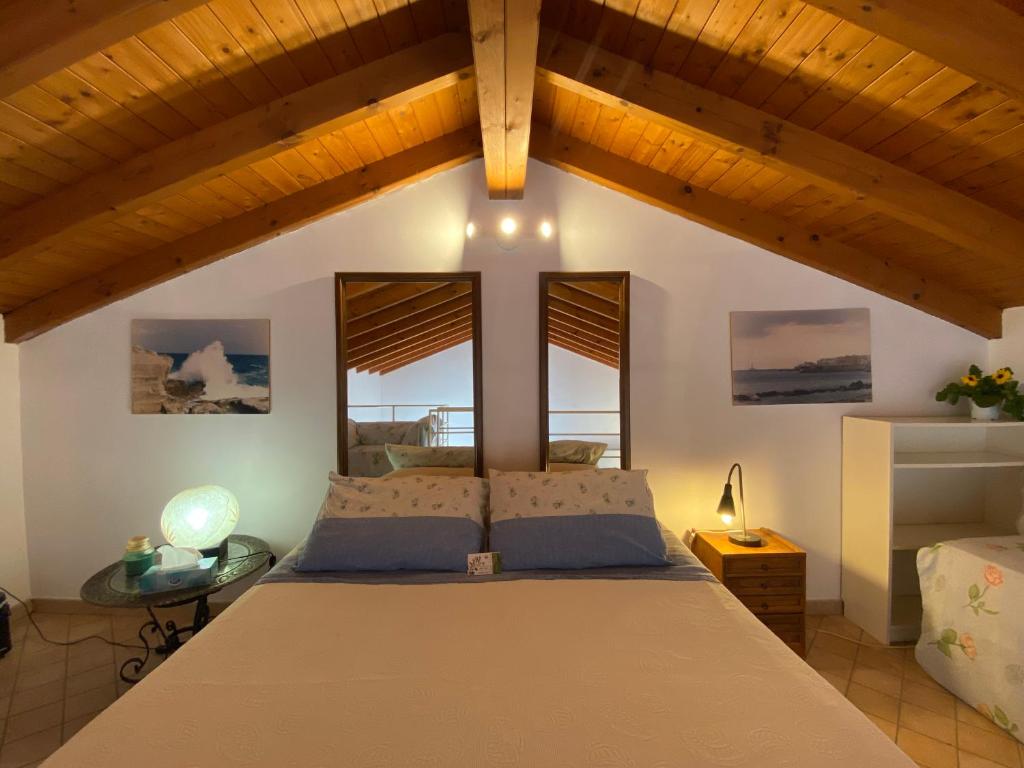 Cama o camas de una habitación en Celi Blu Appartamento