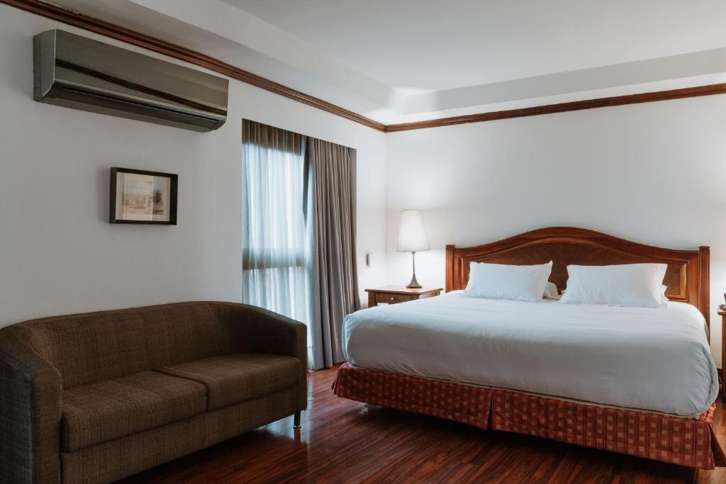 Postel nebo postele na pokoji v ubytování Hotel Park10