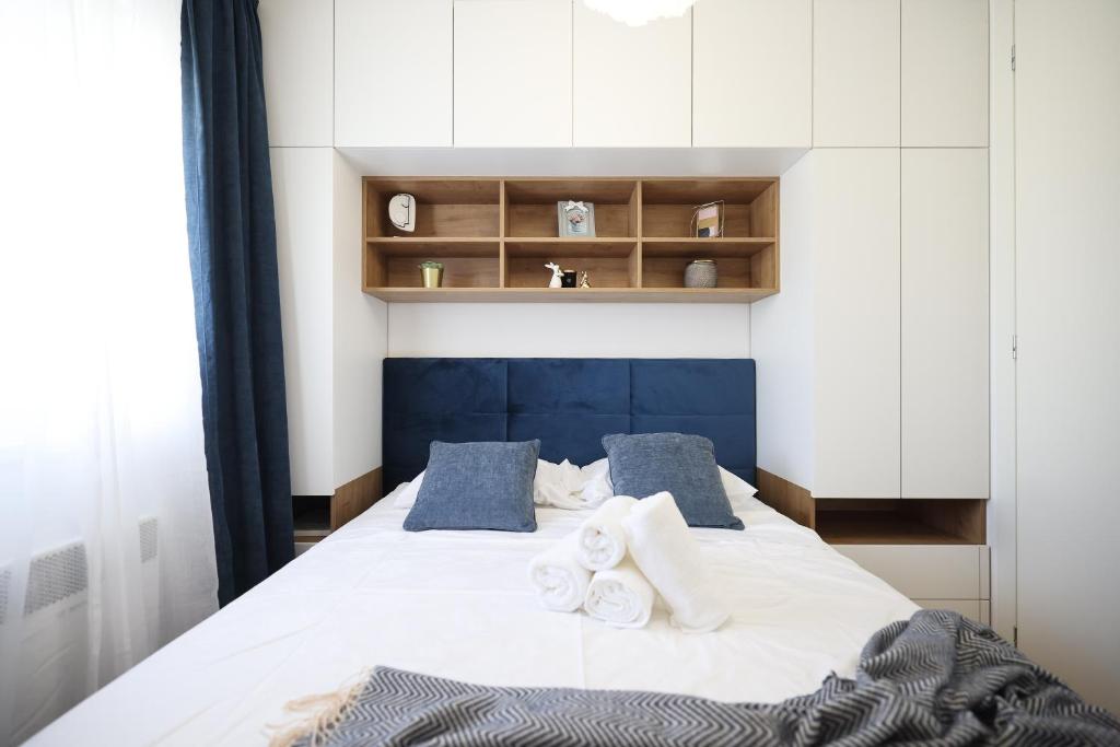 Posteľ alebo postele v izbe v ubytovaní Apartment AnViNi