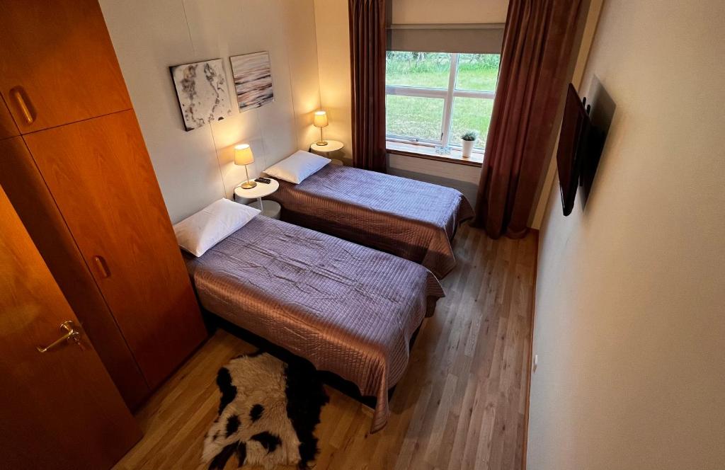 Postel nebo postele na pokoji v ubytování Westfjords - Rooms