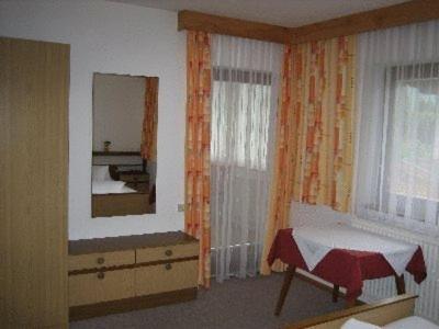 Łóżko lub łóżka w pokoju w obiekcie Ferienwohnungen Pötscher Maria