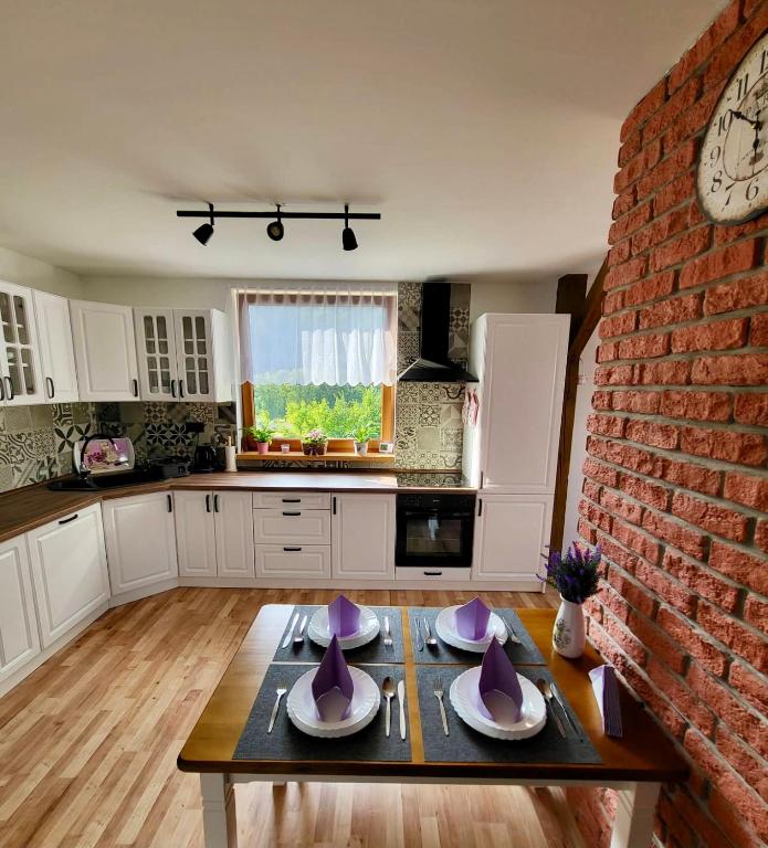 Kuchyň nebo kuchyňský kout v ubytování HARMONY Apartments