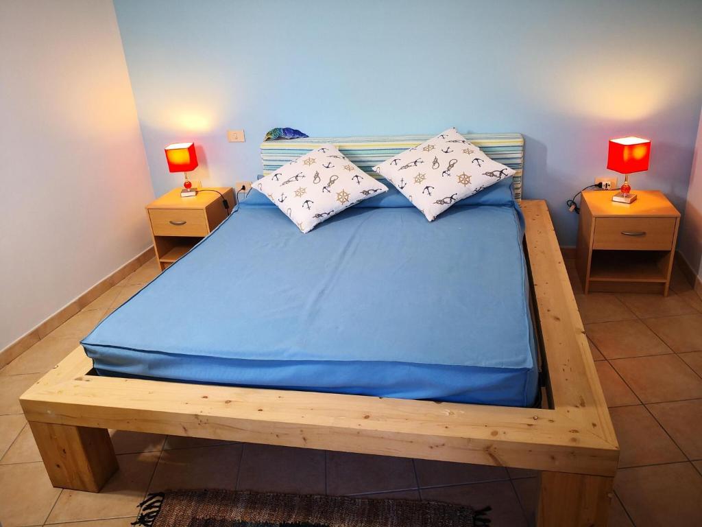 Postel nebo postele na pokoji v ubytování Modern holiday home in San vito lo Capo with garden